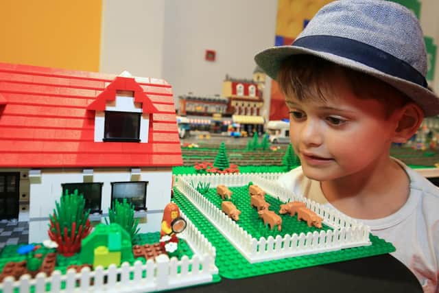 Sheffield Bricktropolis Fringe, which is part of Sheffield Bricktropolis AFOL (Adult Fans of LEGO) display at the Interactive Building Zone. Pictured is Dylan Maddocks, six.