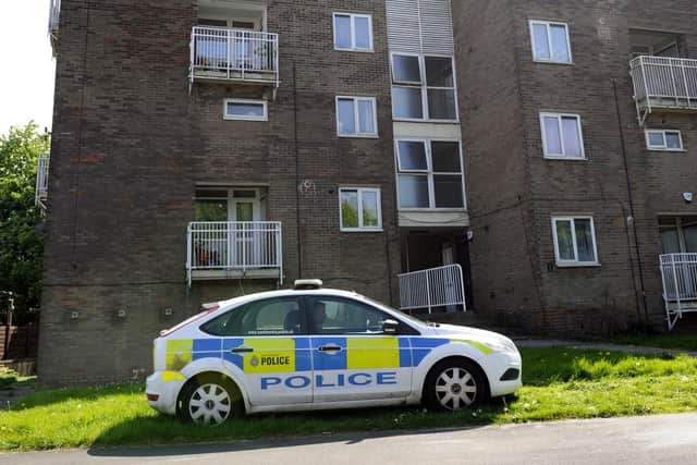 Police outside a block of flats on Leighton Road,Gleadless Valley......Pic Steve Ellis