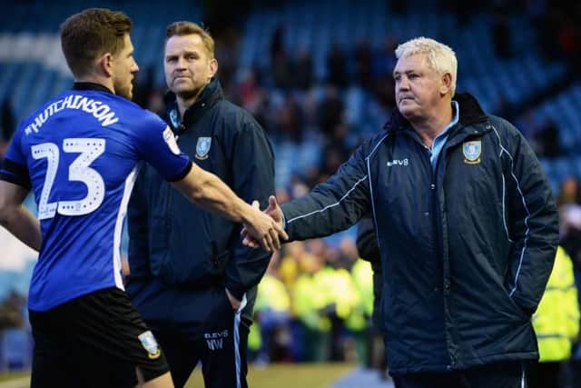 Sheffield Wednesday manager Steve Bruce with Sam Hutchinson