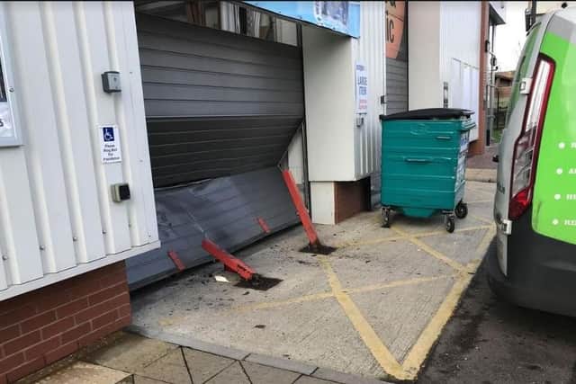 A vehicle was driven into the shutters outside Screwfix in Hillsborough in a ram raid (Andy Granger)