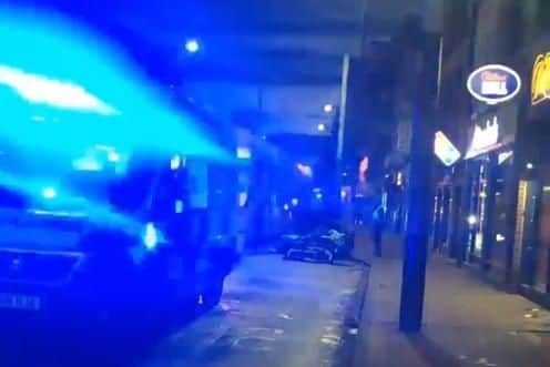A woman was struck by a tram on West Street in Sheffield city centre this morning