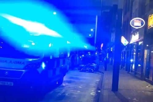 A woman escaped with minor injuries after being struck by a tram on West Street in Sheffield
