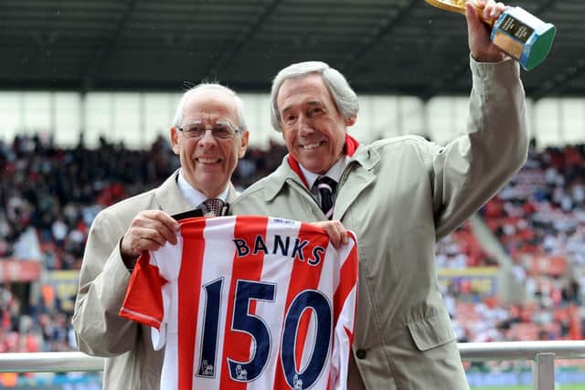 Stoke City goalkeeper Gordon Banks holds the Jules Rimet trophy as he is awarded a  a Stoke City shirt before the game. Photo: Clint Hughes/PA Wire.