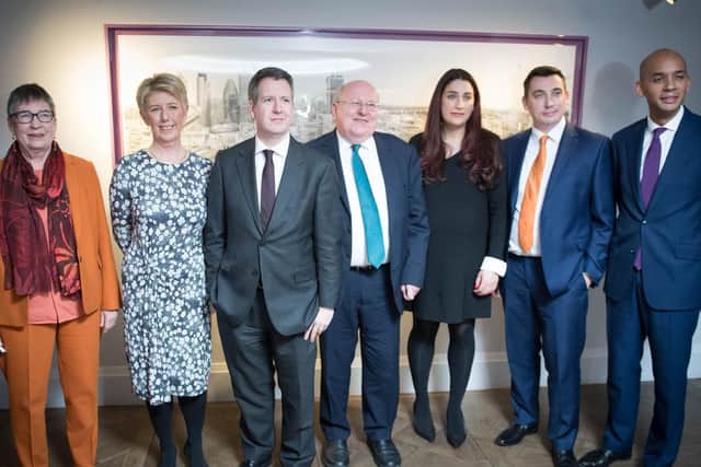 The seven MPs who have quit the Labour Party to create a new Independent Group. Pictured left to right are Ann Coffey, Angela Smith, Chris Leslie, Mike Gapes, Luciana Berger, Gavin Shuker and Chuka Umunna (pic: Stefan Rousseau/PA Wire)