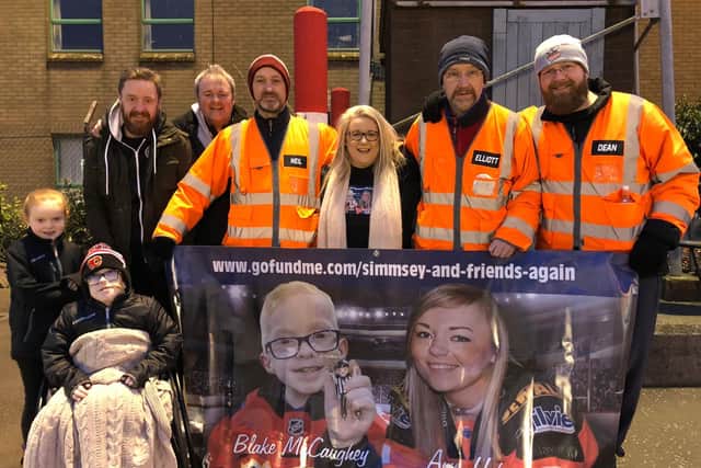 Simmsey and Friends pictured at the end of their walk from Sheffield to Belfast. Pictured are: Blake McCaughey (front), with sister Pixie, and (left to right) Andrew McCaughey, Dave Simms, Neil Edwards, Christine McCaughey, Elliott Hall and Dean Woolley.