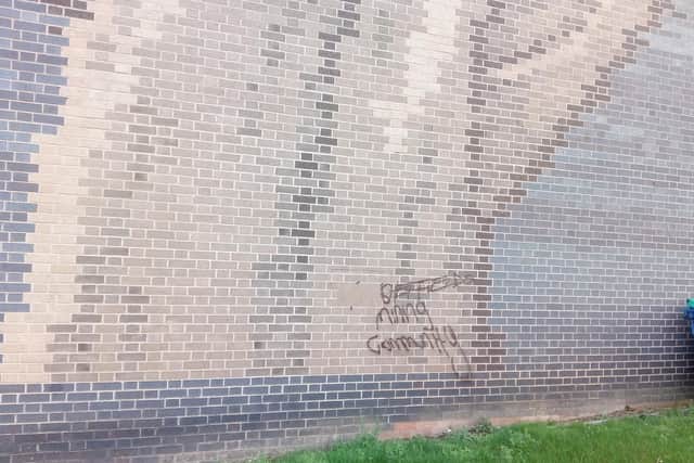 Graffiti on the Steelworker brick mural, Castle Street, Sheffield. Picture: Sam Cooper / The Star.