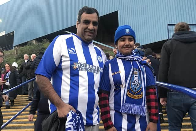 Shaffaq Mohammed with his daughter at Hillsborough.