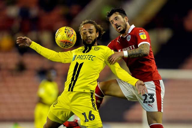 Marcus Harness and Daniel  challenge for the ball.
 FC v Burton Albion.  SkyBet League 1.  Oakwell Stadium.
19  February 2019.  Picture Bruce Rollinson