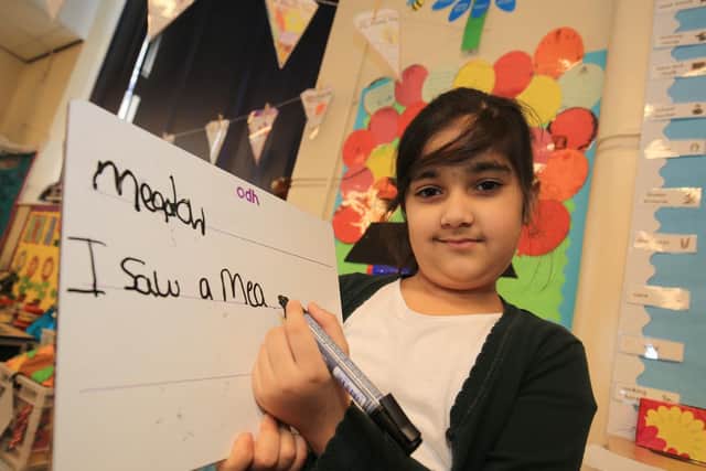 At Hunters Bar infants there is a focus on both reading and writing. Pictured is Haleema, seven.