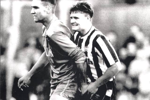 Vinnie Jones and Paul Gascoigne on the field in 1987.