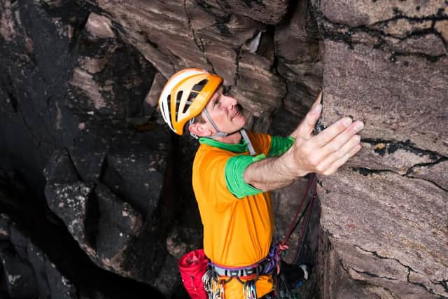 Dave cragging on rocks (Photo: Ed Smith)