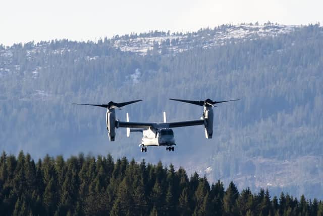 TOPSHOT - The United States' V-22 Osprey, a multi-mission, tiltrotor military aircraft with both vertical takeoff and landing, flies during a joint demonstration as part of the NATO Trident Juncture 2018 exercise in Byneset near Trondheim, Norway, October 30, 2018. - Trident Juncture 2018, is a NATO-led military exercise held in Norway from 25 October to 7 November 2018. The exercise is the largest of its kind in Norway since the 1980s. Around 50,000 participants from NATO and partner countries, some 250 aircraft, 65 ships and up to 10,000 vehicles take part in the exercise. The main goal of Trident Juncture is allegedly to train the NATO Response Force and to test the alliance's defence capability. (Photo by Jonathan NACKSTRAND / AFP)        (Photo credit should read JONATHAN NACKSTRAND/AFP/Getty Images)
