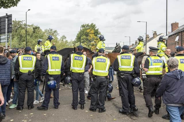 Police officers on duty at the Steel City derby yesterday