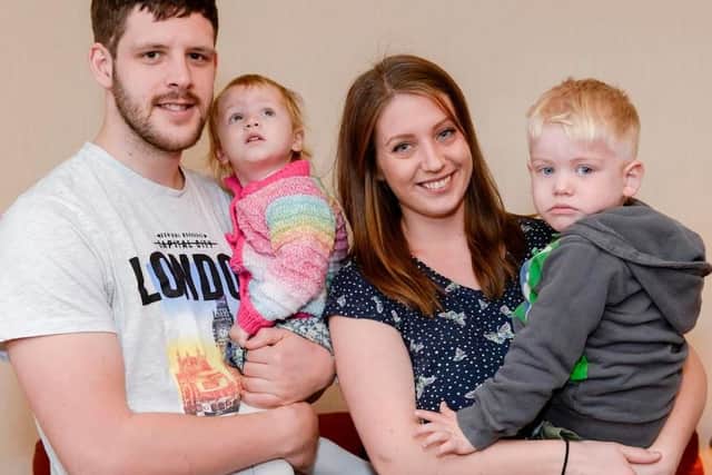 Jack Lacey with his dad Wesley, mum Rebecca and sister Charlotte