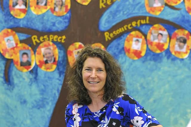 Headteacher Rachel Edwards with the school's tree of values