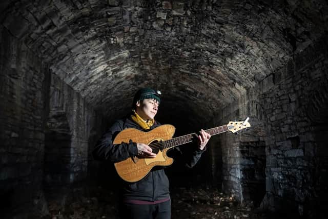Rhiannon Scutt performs to Urban Cavers as an underground network of rivers are opened up to the public for an audio-visual spectacular during the Sheffield Adventure Film Festival. Picture: Danny Lawson/PA Wire