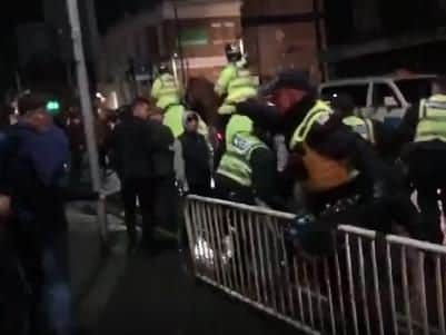 A still from the video footage of trouble outside the Sheffield derby at Hillsborough on Monday night.