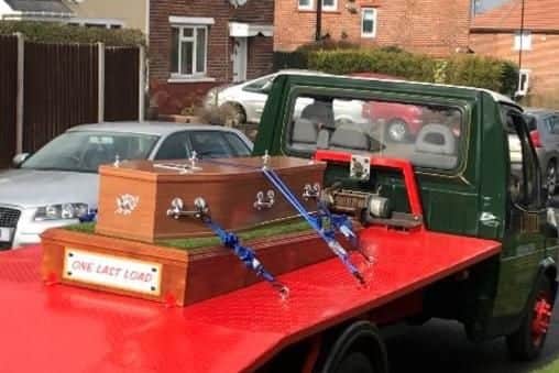 Jeffrey Hall's coffin on the back of his old recovery truck, which was lovingly restored ahead of his funeral