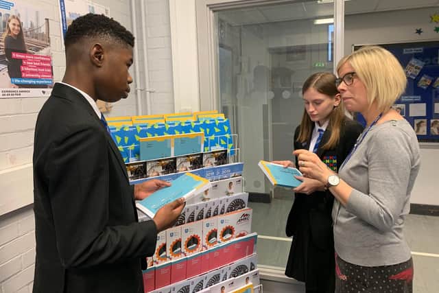Amy Cooke, Careers Advisor for Sheffield Futures gives careers advice to Year 10 students Djessy Kihuyu and Sophie Fuller