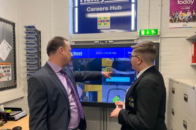 Darren Littlewood, Financial Advisor for Henry Boot, explaining to Year 10 student Cameron Smith about the job roles at the construction company