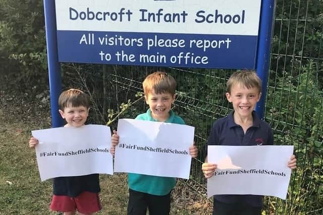 Pupils at Dobcroft Infant School backing the fair fund Sheffield schools campaign