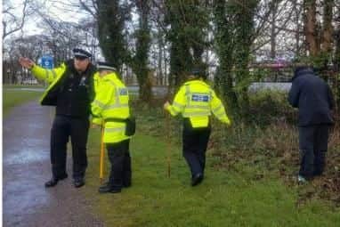 Police officers in Lowedges this morning