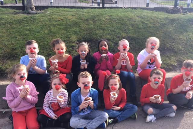 Children from Beck Primary School supporting red nose day