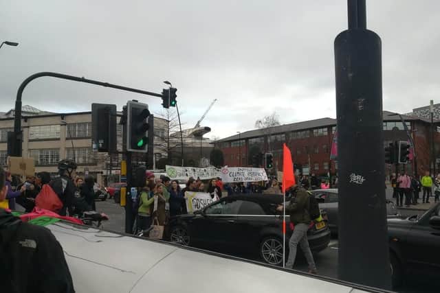 The protesters on the pelican crossing outside on Sheaf Street, Sheffield. Picture: Niall Gandy.