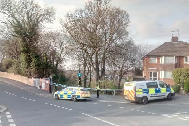 A police cordon is in place after a man was attacked on Gayton Road