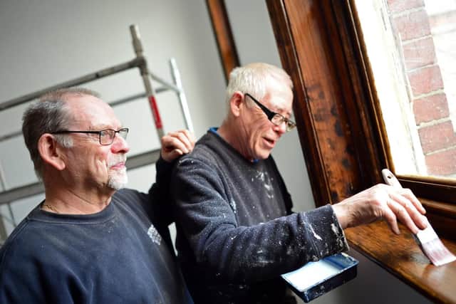 Mick and Geoff, pictured, working on the new education rooms. Picture: Marie Caley