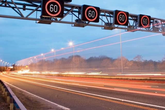 Smart motorways see overhead gantries install temporary speed limits.