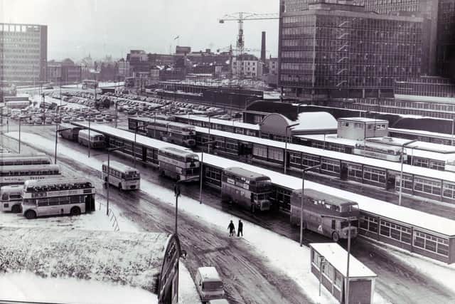 It's snowing, but at Pond Street the buses are still running.