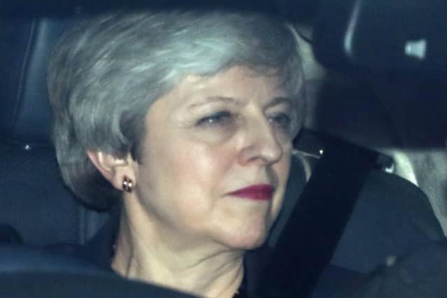 Theresa May leaves the Houses of Parliament in Westminster on March 27. Picture: Daniel Leal-Olivas/AFP/Getty Images.