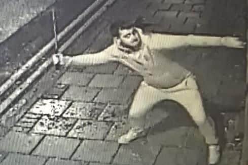 A man is wanted by the police after a Barnsley pub was vandalised