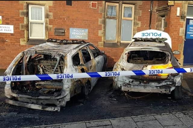 South Yorkshire Police cars set alight in arson attack outside station