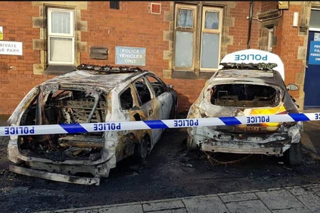 Two police cars were damaged in an arson attack outside Goldthorpe police station this morning (Pic: Martyn Arnold)