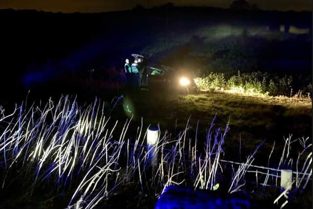 The car crashed into a field in Rotherham following a police chase