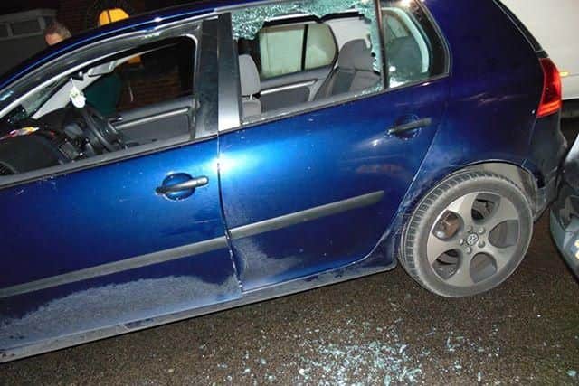One of the cars which was damaged as violence flared on St James Gardens in Balby, Doncaster