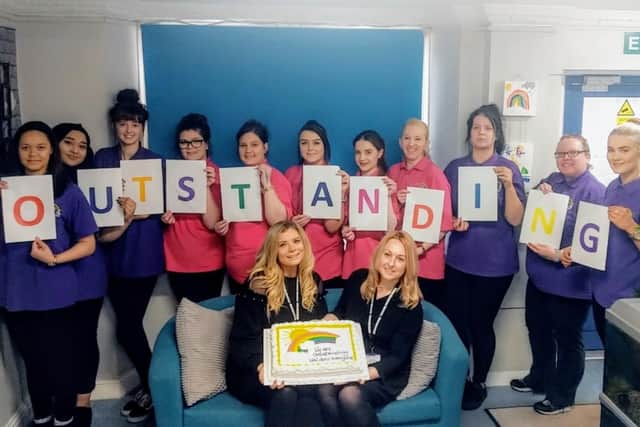 Staff at Sunny Meadows Nursery celebrating the 'outstanding' Ofsted judgement