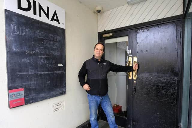 A break in at DINA. DINA is a DIY, not-for-profit arts space in Sheffield City Centre. A Go Fund Me page has been set up to help raise money. Director Malcolm Camp is pictured with the broken door glass where the break in took place.