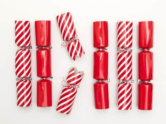 Allowed in hold: Yes. Allowed in luggage: Yes. Allowed on ones person: Yes. Christmas crackers must be in their original retail packaging. Note: Check with your airline as some forbid passengers to carry Christmas crackers.