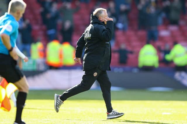 Chris Wilder of Sheffield United runs to confront referee David Webb at the final whistle: James Wilson/Sportimage