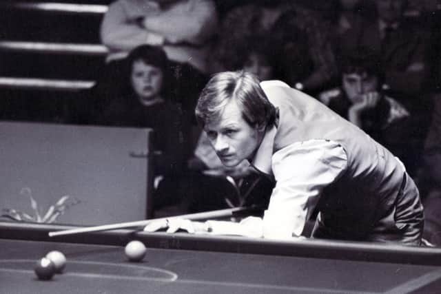 Fans' favourite Alex 'Hurricane' Higgins, lines up a shot at the Crucible in 1979.