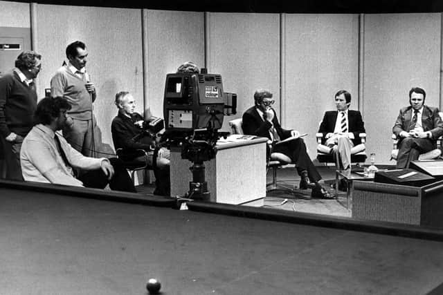 TV host David Vine discusses the action in an early BBC broadcast.