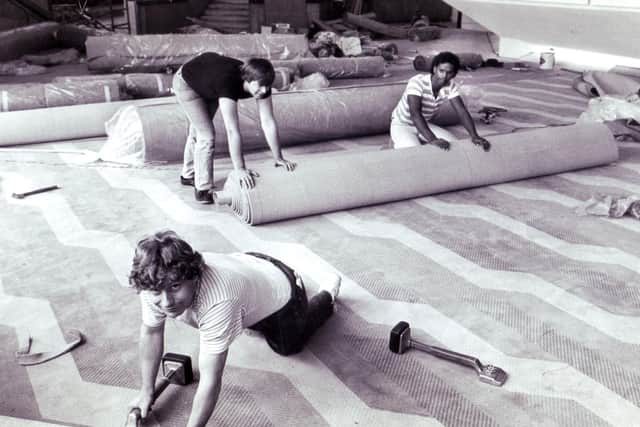 Laying down those infamous eye catching carpets!