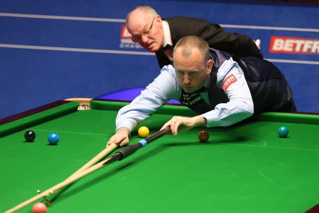 Defending champion Mark Williams during day one of the 2019 Betfred World Championship at The Crucible, Sheffield. Picture: Nigel French/PA Wire