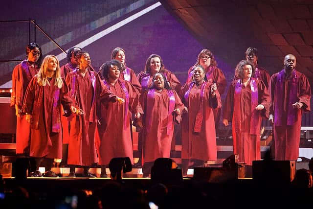 The choir performing with Take That. Pic: DAVID FAWBERT PHOTOGRAPHY