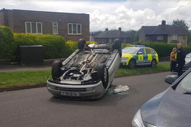 A car overturned and landed on its roof in Parson Cross this afternoon