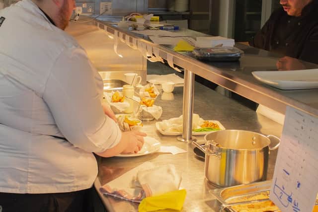 Busy scenes on the pass at the Hallam View restaurant