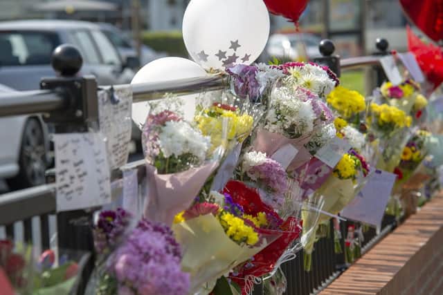 Floral tributes on Brinsworth Lane in Rotherham to Ryan Durkin who was killed by a hit-and-run driver in a stolen car. Picture: Scott Merrylees